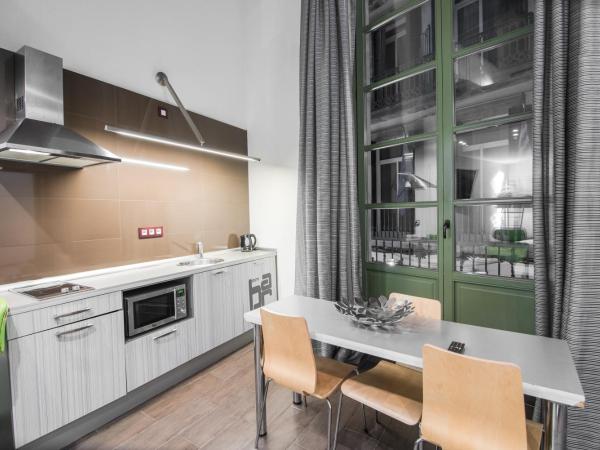 Petit Palace Boqueria Garden : photo 2 de la chambre appartement duplex (6 adultes)