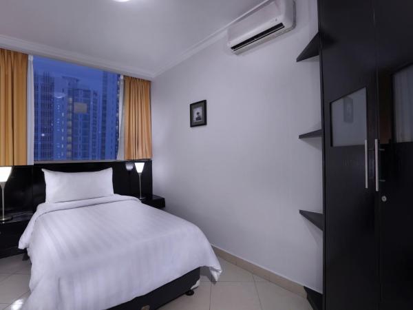 Horison Ultima Suite & Residences Rasuna Jakarta : photo 7 de la chambre suite affaires