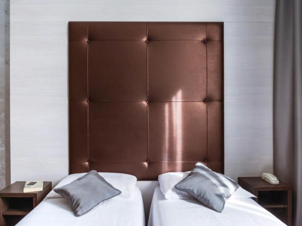 Ibis Styles Milano Centro : photo 1 de la chambre chambre lits jumeaux