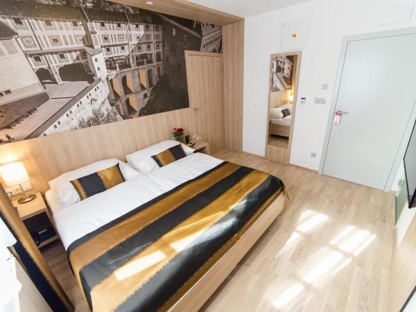 Garni hotel Castle Bridge : photo 2 de la chambre chambre double ou lits jumeaux standard