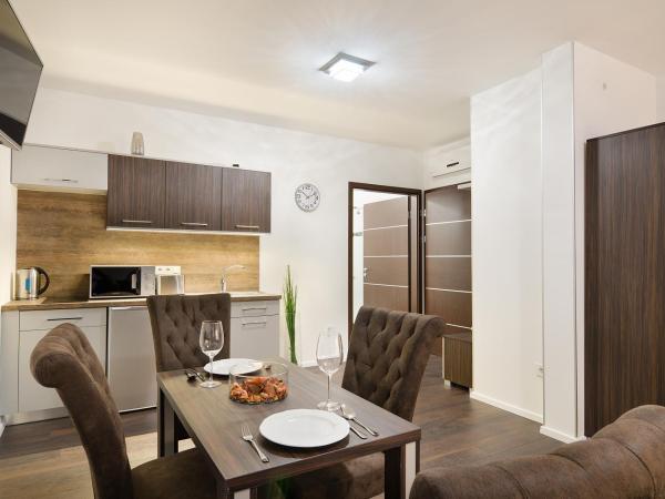 Paulay Downtown Apartments : photo 1 de la chambre chambre double standard