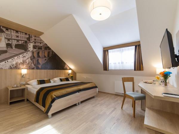 Garni hotel Castle Bridge : photo 2 de la chambre chambre quadruple confort