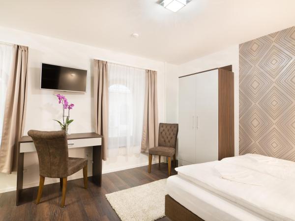 Paulay Downtown Apartments : photo 6 de la chambre chambre double standard