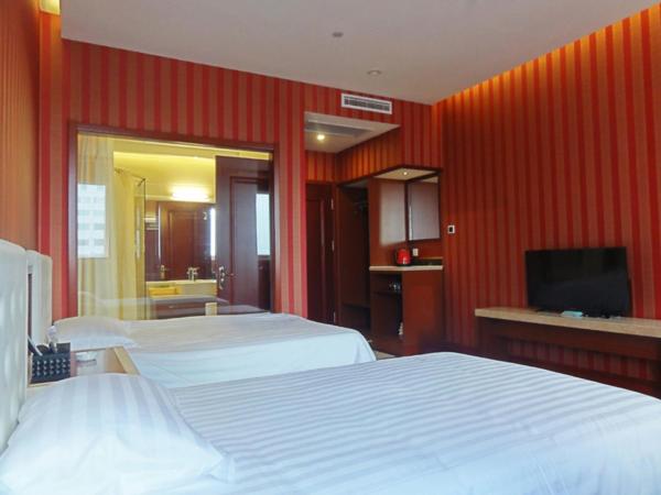 Hua Qi Kaiserdom Hotel Zhongshan Road St Michael's Cathedral and Zhanqiao Pier Qingdao : photo 5 de la chambre chambre lits jumeaux deluxe