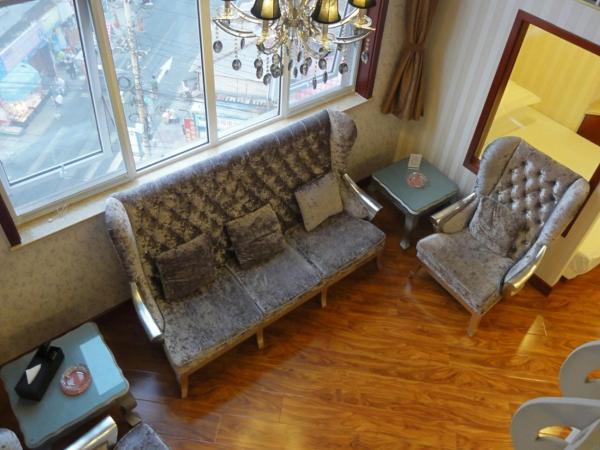 Hua Qi Kaiserdom Hotel Zhongshan Road St Michael's Cathedral and Zhanqiao Pier Qingdao : photo 5 de la chambre suite en duplex