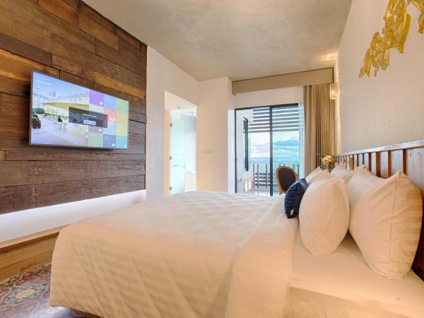 Natee The Riverfront Hotel Kanchanaburi : photo 6 de la chambre chambre double ou lits jumeaux deluxe - vue sur rivière