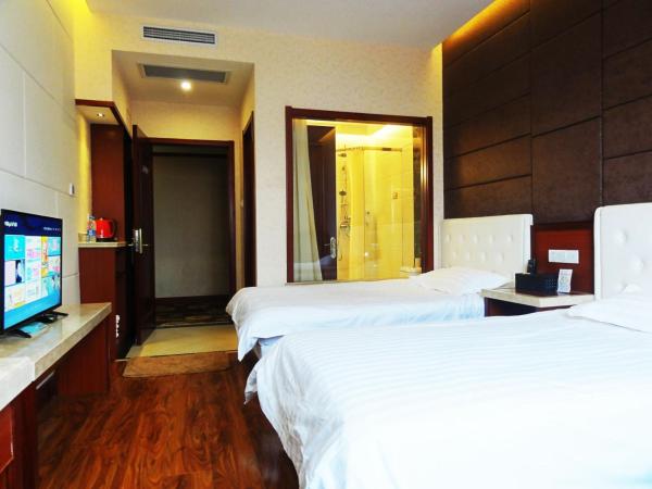 Hua Qi Kaiserdom Hotel Zhongshan Road St Michael's Cathedral and Zhanqiao Pier Qingdao : photo 1 de la chambre chambre lits jumeaux - vue sur ville