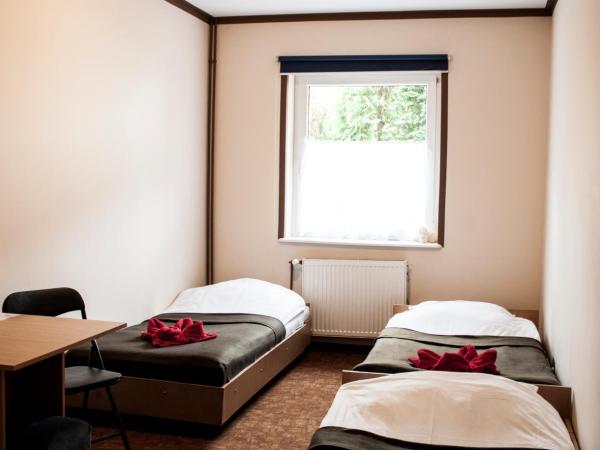 Gościniec Silver : photo 5 de la chambre chambre triple