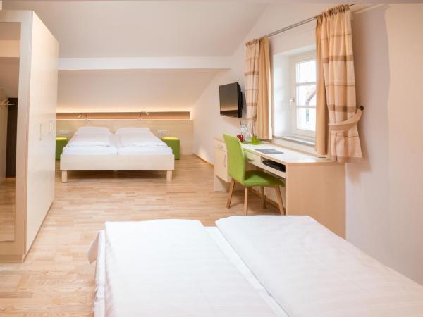 Das Grüne Hotel zur Post - 100 % BIO : photo 1 de la chambre chambre familiale