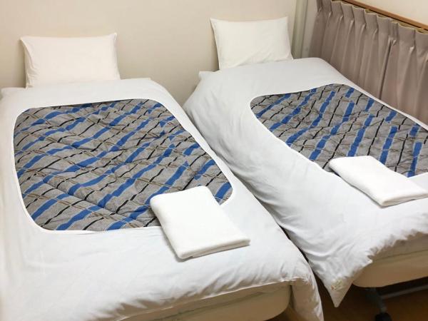 Hotel Meigetsu : photo 2 de la chambre chambre lits jumeaux standard