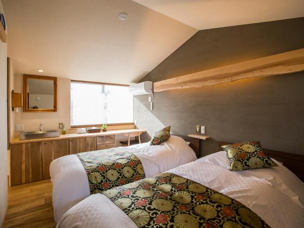 Shioriya : photo 1 de la chambre chambre lits jumeaux