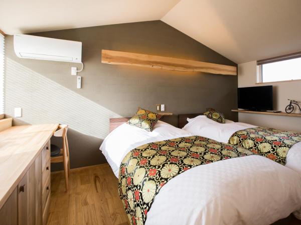 Shioriya : photo 2 de la chambre chambre lits jumeaux