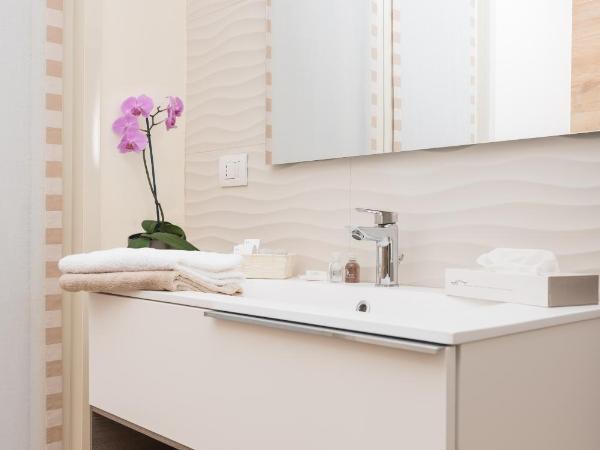 Relais Dei Mandorli : photo 1 de la chambre chambre lits jumeaux avec salle de bains privative séparée