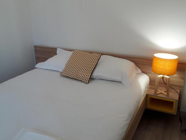 Apparteo Dijon : photo 1 de la chambre appartement - vue sur jardin