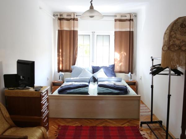 Hív-Lak Apartman : photo 3 de la chambre chambre familiale avec salle de bains privative