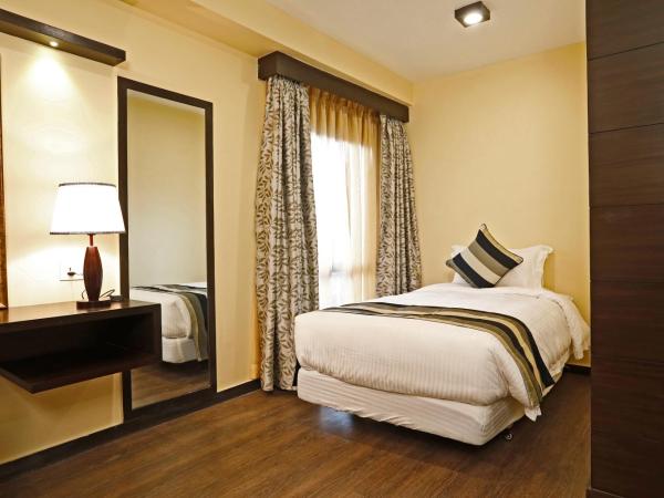 United Business Hotel : photo 1 de la chambre suite familiale