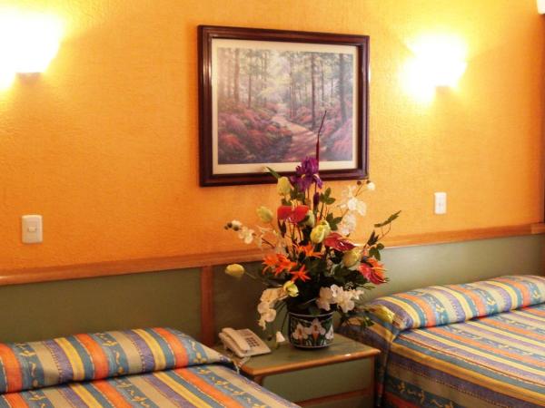 Segovia Regency : photo 3 de la chambre chambre lits jumeaux