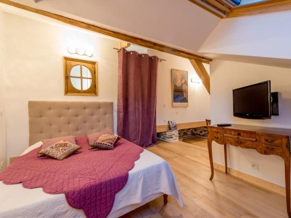 Au Cheval Blanc - appartements et chambres d'hôtes : photo 1 de la chambre chambre triple – vue sur montagne