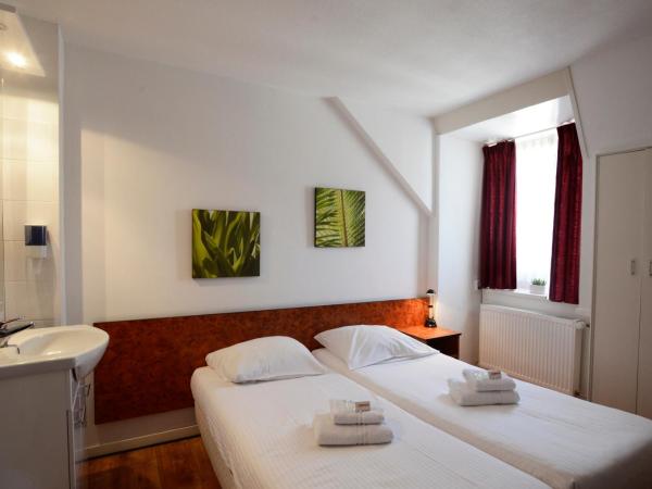 Hotel Benno : photo 4 de la chambre chambre lits jumeaux avec salle de bains commune