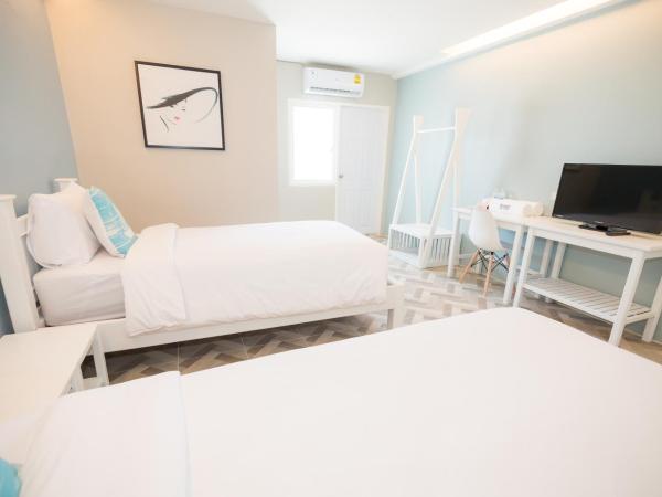 THE HABITAT Koh Chang : photo 4 de la chambre chambre lits jumeaux avec salle de bains