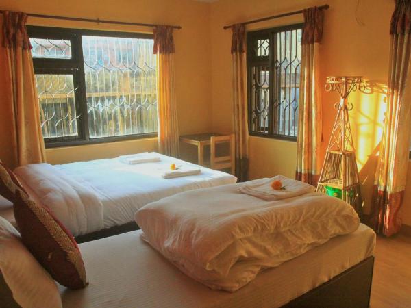 Kathmandu Village House : photo 2 de la chambre chambre triple deluxe