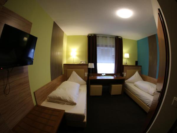 Gästehaus Palmengarten : photo 4 de la chambre chambre lits jumeaux