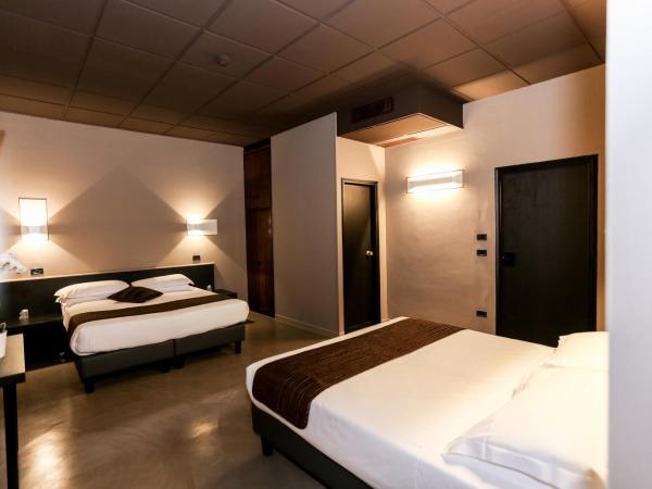 Hotel Mignon : photo 2 de la chambre chambre quadruple avec salle de bains privative