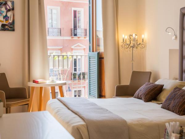 Antico Corso Charme : photo 5 de la chambre chambre double ou lits jumeaux deluxe - vue sur ville