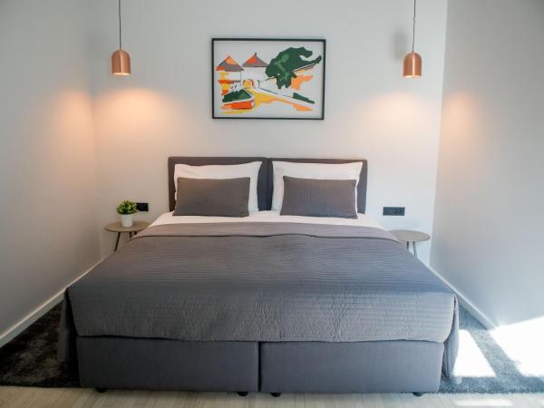 Zagreb City Vibe Apartments & Rooms : photo 1 de la chambre chambre double ou lits jumeaux avec lit d'appoint