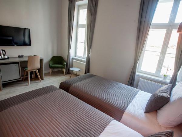 Zagreb City Vibe Apartments & Rooms : photo 4 de la chambre chambre double ou lits jumeaux - vue sur ville