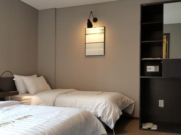 Grid Inn Hotel : photo 4 de la chambre chambre triple