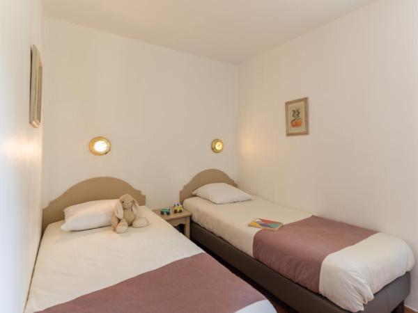 Résidence Pierre & Vacances Les Rives de Cannes Mandelieu : photo 6 de la chambre appartement 2 chambres avec terrasse (6 personnes) - rez-de-jardin