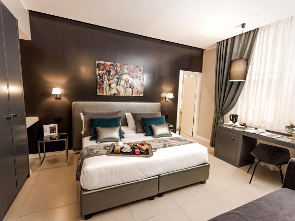 Delle Vittorie Luxury Rooms&Suites : photo 5 de la chambre chambre deluxe double ou lits jumeaux