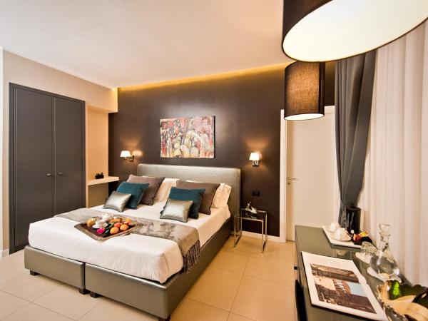 Delle Vittorie Luxury Rooms&Suites : photo 1 de la chambre chambre deluxe double ou lits jumeaux