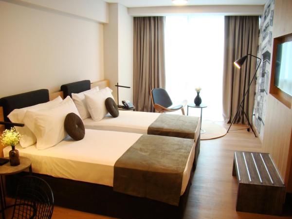 Dazzler by Wyndham Rosario : photo 9 de la chambre twin room with two twin beds - mobility access - non-smoking - garden view