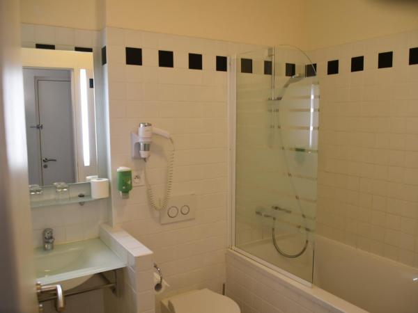 Hôtel Raymond 4 Toulouse : photo 1 de la chambre chambre lits jumeaux confort