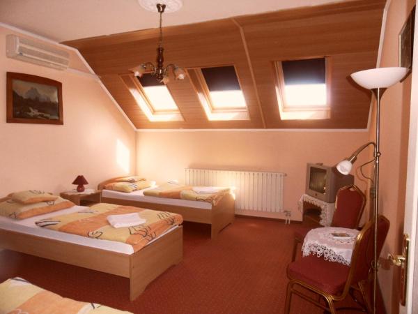 Kálmán Panzió : photo 3 de la chambre chambre triple avec salle de bains