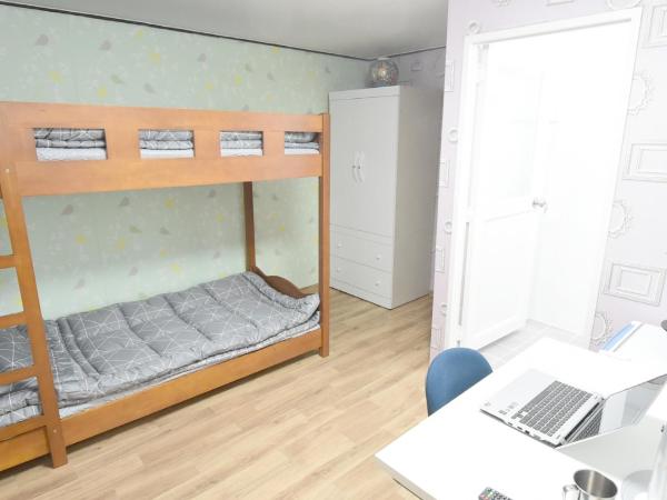 Photo Park Guesthouse : photo 8 de la chambre chambre lits jumeaux avec salle de bains privative