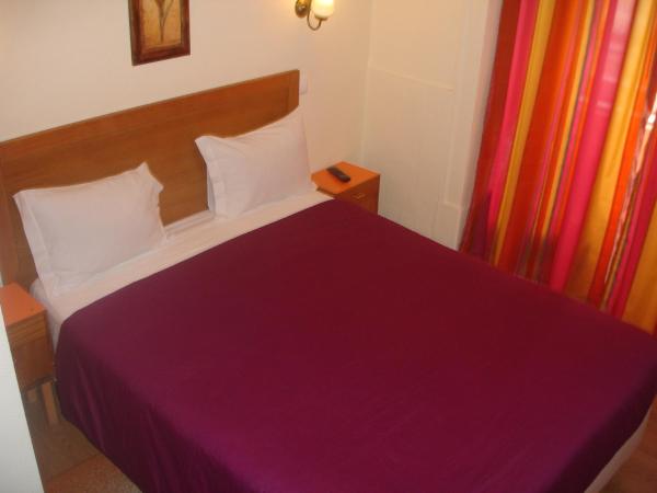 Pensao Estacao Central : photo 5 de la chambre chambre simple