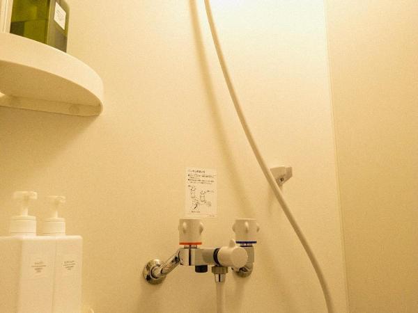 GuestHouse Hostel MangeTak ゲストハウス マングタック広島 : photo 9 de la chambre chambre lits jumeaux standard