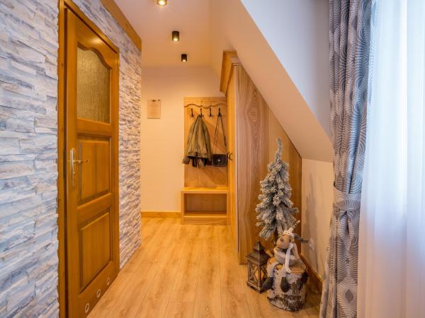 Willa Góralsko Riwiera : photo 5 de la chambre chambre triple deluxe