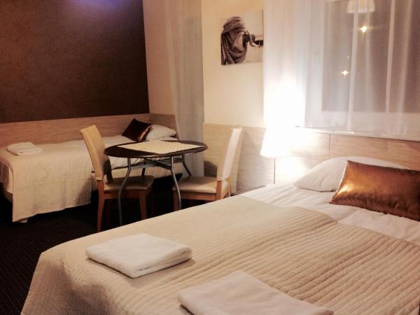 Villa 33 Blisko Plaży : photo 2 de la chambre chambre triple