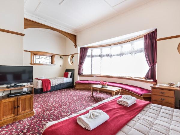 Halswell Lodge : photo 4 de la chambre chambre lit king-size avec baignoire spa - lodge