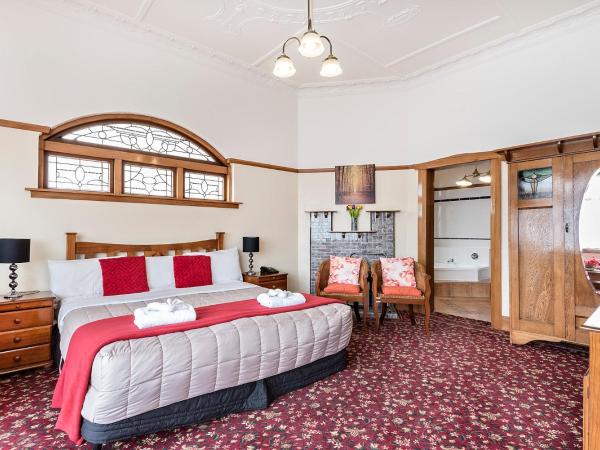 Halswell Lodge : photo 5 de la chambre chambre lit king-size avec baignoire spa - lodge