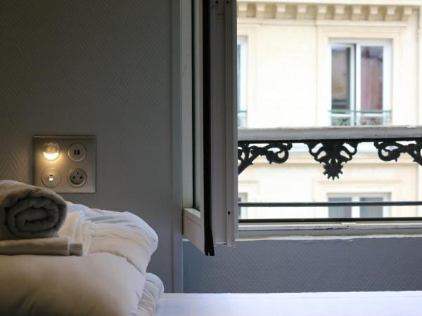 Plug inn Montmartre by Hiphophostels : photo 3 de la chambre chambre triple
