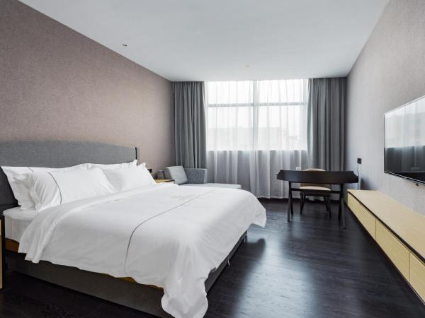 Guangzhou Mustin Hotel : photo 1 de la chambre chambre standard lit queen-size