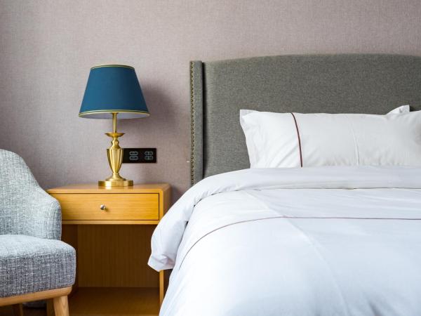 Guangzhou Mustin Hotel : photo 9 de la chambre chambre lits jumeaux standard