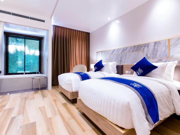 Wintree City Resort : photo 7 de la chambre chambre lits jumeaux premier - vue sur jardin