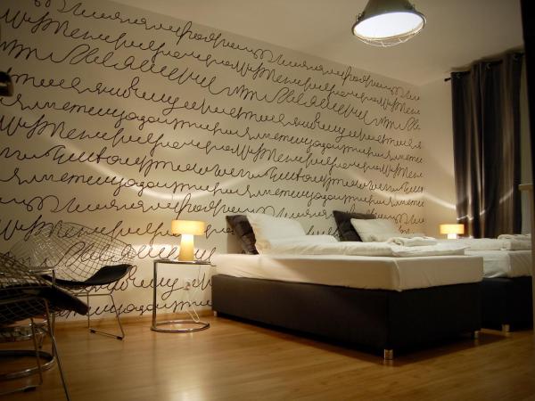 ApartHostel Warszawa : photo 1 de la chambre chambre double ou lits jumeaux avec salle de bains commune