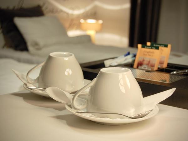 ApartHostel Warszawa : photo 5 de la chambre chambre double ou lits jumeaux avec salle de bains commune